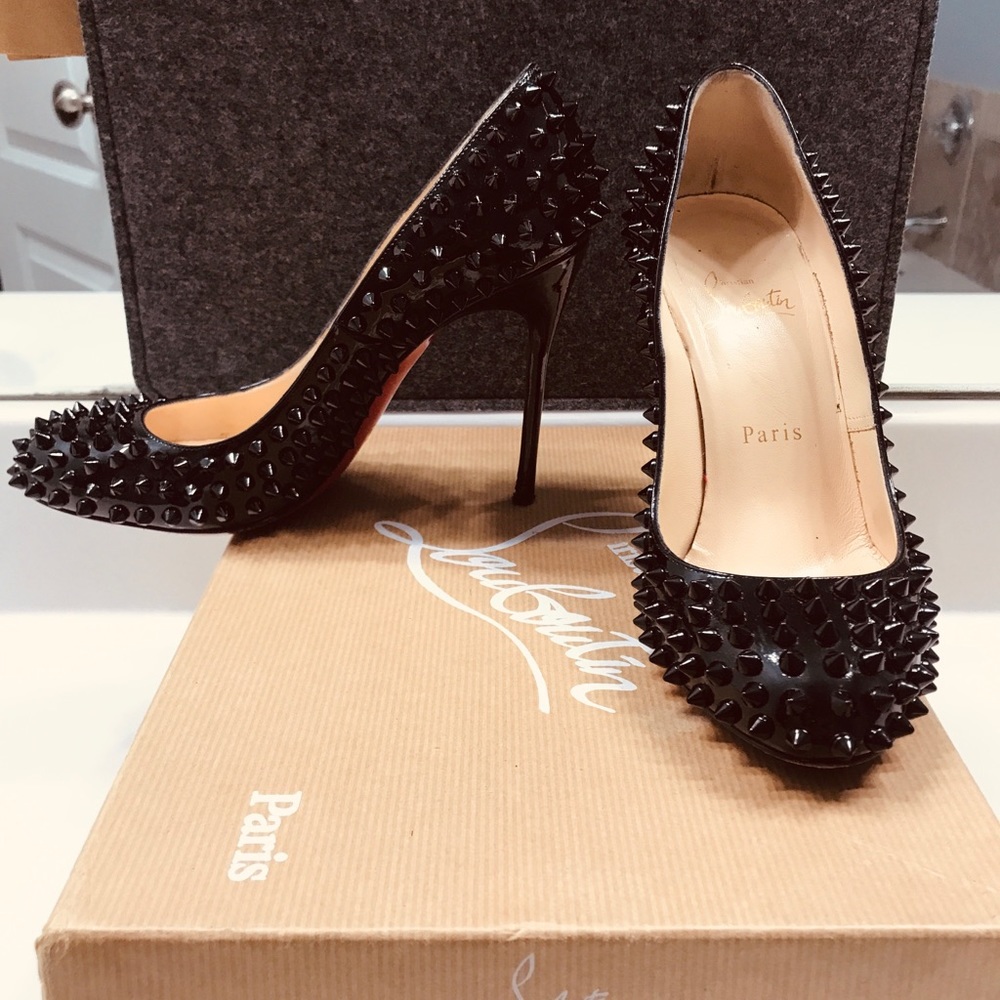 Black Spikes high heel Louboutin shoes.
